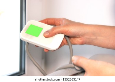 Tonometer, in the hand a medical device for measuring blood pressure, - Shutterstock ID 1352663147