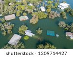tons of homes totally destroyed , flooded and submerged under water , Historic Flooding aerial drone view above Homes and Houses Central Texas Flooding severe weather and climate change flooding