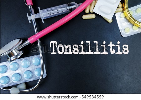 Tonsillitis word, medical term word with medical concepts in blackboard and medical equipment