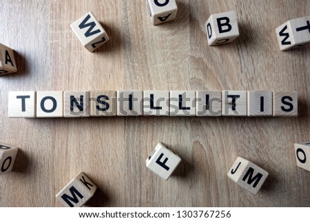 Tonsillitis word from wooden blocks on desk