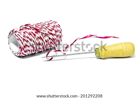 Tool with red and white thread for drill and bind the paper on a white background