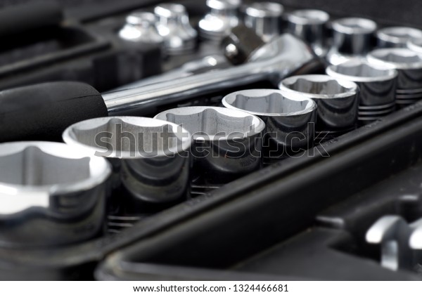 Tool\
repairman, mechanic tool set in the\
background.