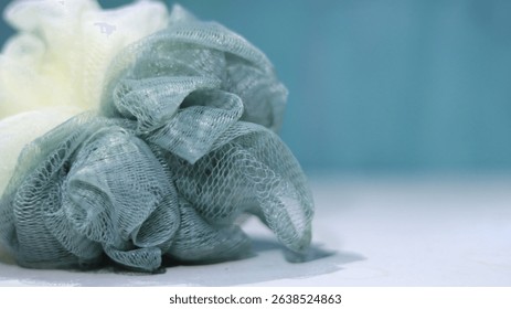 A tool for scrubbing the body while bathing
