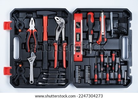 Toolbox with hand instruments for repair, close up. Set of hand tools for maintenance on white background