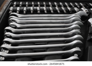 Toolbox with many different tools, including wrenches and screwdrivers. Tools in a set. Universal repair tool set. High quality photo.