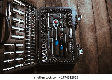 Toolbox On The Wooden Floor. View From Above