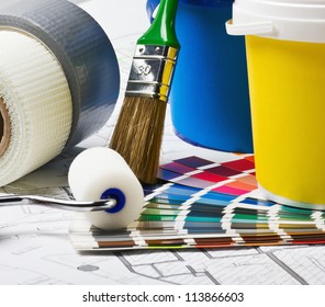 tools and accessories for home renovation on an architectural drawing - Powered by Shutterstock