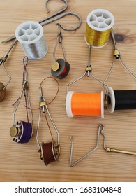 Tools And Accessories For Making Fishing Lures. Colored Threads On Reels.