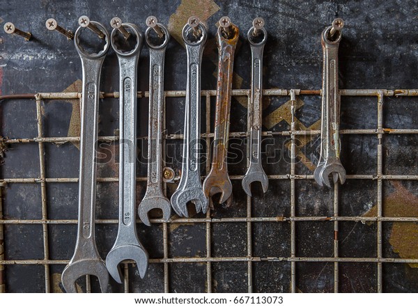 Tools for car repair in Workshop. Car\
repair equipment in the tool box in car repair\
shop