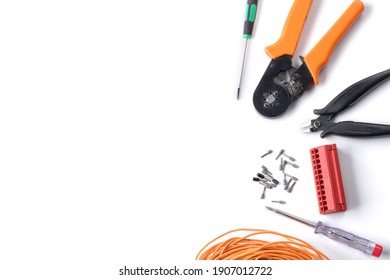 Tools For Electrical Installations On White Background With Copy Space.