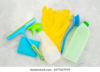 Tools and equipment for housework with cleaning products, top view. - Powered by Shutterstock
