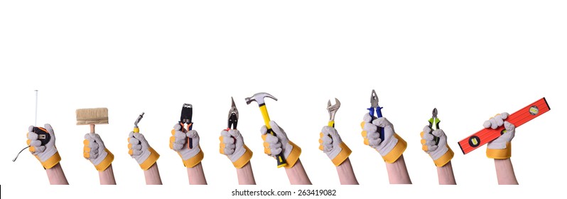 Tools in hand . Isolated on white background . - Shutterstock ID 263419082