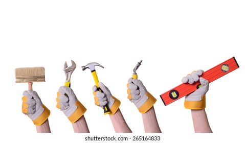 Tools in hand . Isolated on white background . - Shutterstock ID 265164833