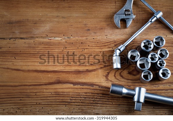 tools kit on wooden\
table
