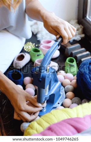 Tools and material for working with merino wool. Creation of children's shoes made of wool.