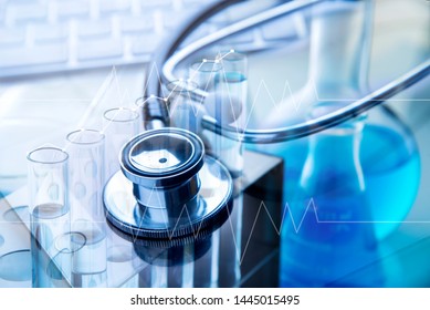 tools medical with Healthcare and Different laboratory glassware with colored liquid and with reflex background concept