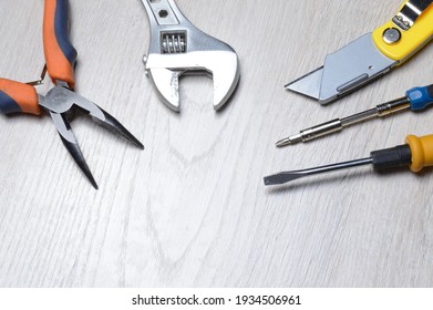 Tools For Minor Home Repairs Are On The Countertop. View From Above.