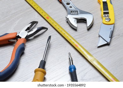 Tools For Minor Home Repairs Are On The Countertop. View From Above.