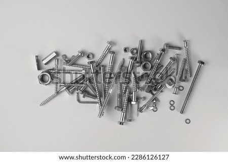 tools. on a light background, construction and fasteners, bolts, nuts and more. for advertising banners of construction label stores and more