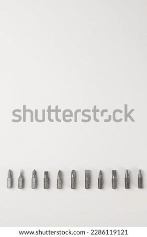 tools. on a light building bits and nozzles for a screwdriver. for advertising banners of construction label stores and more