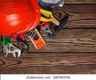 Tools on wood  background . Top view. - Shutterstock ID 1007043706