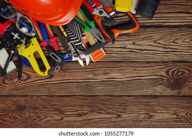 Tools on wood  background . Top view. - Shutterstock ID 1055277179