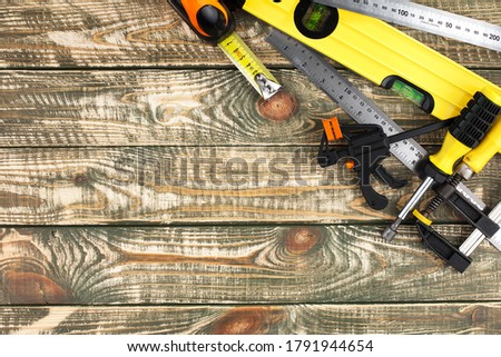 Tools for processing wood and metal, in composition on the table.
