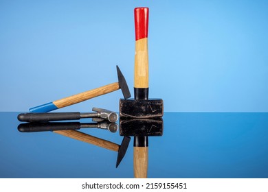 Tools For Repair And Construction, A Sledgehammer And A Pair Of Hammers. Do It Yourself Concept, Sale Of Goods For Renovation And Construction, Home Renovation Services.