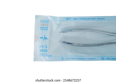 Tools In Sterilization Pouch Steam Sterilization Self Sealing Pouch On White Background Kits In Closed Up Sterilized Pouch (isolated On White Background) Dental Dentistry