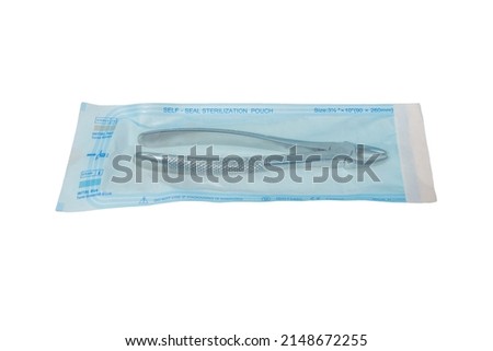 tools in sterilization pouch Steam Sterilization Self Sealing Pouch on white background kits in closed up sterilized pouch (isolated on white background) dental dentistry