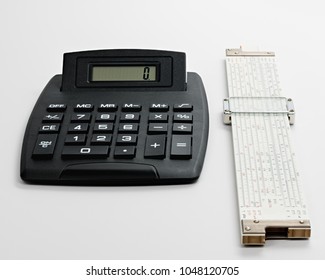 Tools Used By A Mathematician To Evaluate Numbers Calculator And A Slide Rule