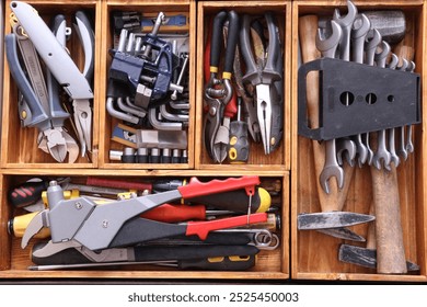 The tools are in wooden boxes.