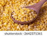 Toor dal or split yellow lentils isolated. Split Chickpea in a Bag Also Know as Chana Dal, Yellow Chana Split Peas, Dried Chickpea Lentils 