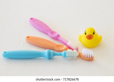 Toothbrush Of Baby Health Care In Oral Cavity For Baby On Background White