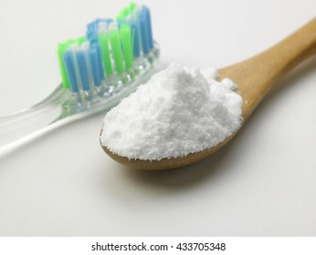 Toothbrush And Baking Soda To Clean