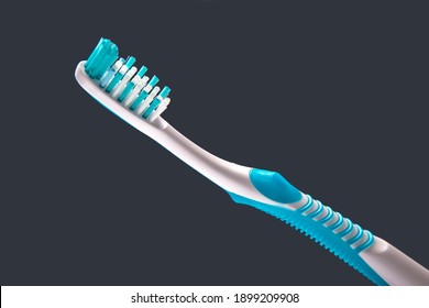 toothbrush close-up on a dark background. oral hygiene