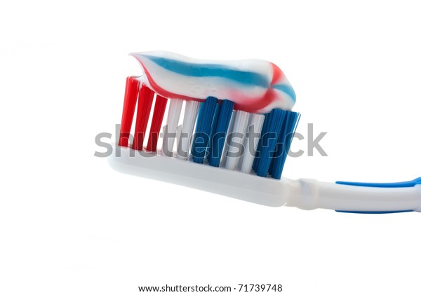 white and blue toothpaste