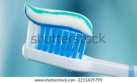 Toothbrush and toothpaste close up view	