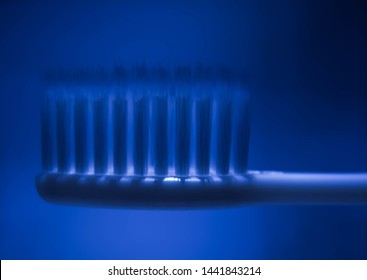 Toothbrush With Under Blacklight Flashlight.