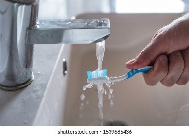 Toothbrush washing under water in the morning Close up view - Shutterstock ID 1539685436