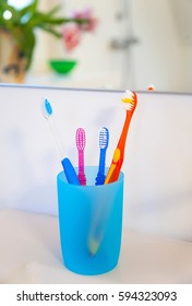 Toothbrushes in cup