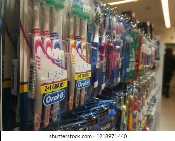 Toothbrushes For Sale In A Pharmacy Aisle For Medical Dental Prevention As Advised By Dentist Association In Milan,Italy-October 2018