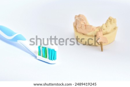 Toothpaste applied on a brush Toothpaste toothbrush teeth impressions