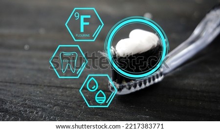Toothpaste at brush with technology icon for explain chemical element flourine, teeth icon and water humidity. Dental explanation concept. Fluorine symbol F with atomic data number 9 
