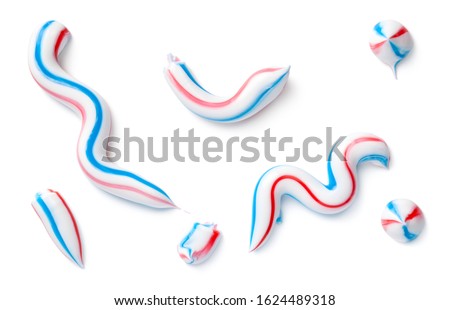 Toothpaste isolated on white background. Top view, flat lay