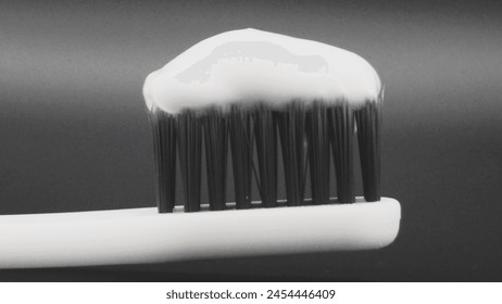 Toothpaste on a white toothbrush