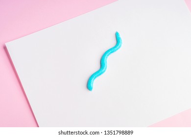 Toothpaste Snake On White Background. Personal Dental Hygiene Concept