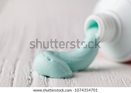 Toothpaste squeezed out from a toothpaste tube