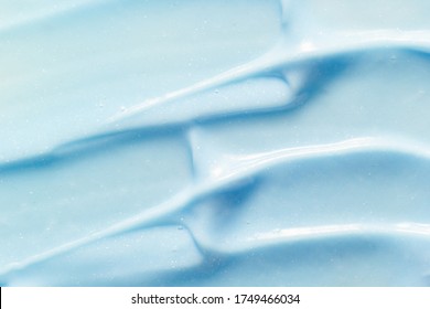 Toothpaste Texture. Blue Color Abrasive Dental Paste Smudged Close Up