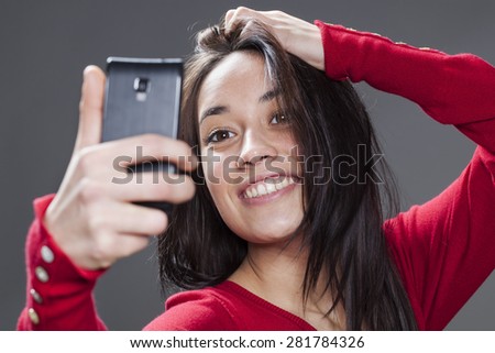 toothy smile on self-portrait for beautiful multi-ethnic teenager